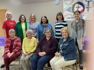 A group of Gamma Phi Iota sorority sisters from the 1970s pose for a picture