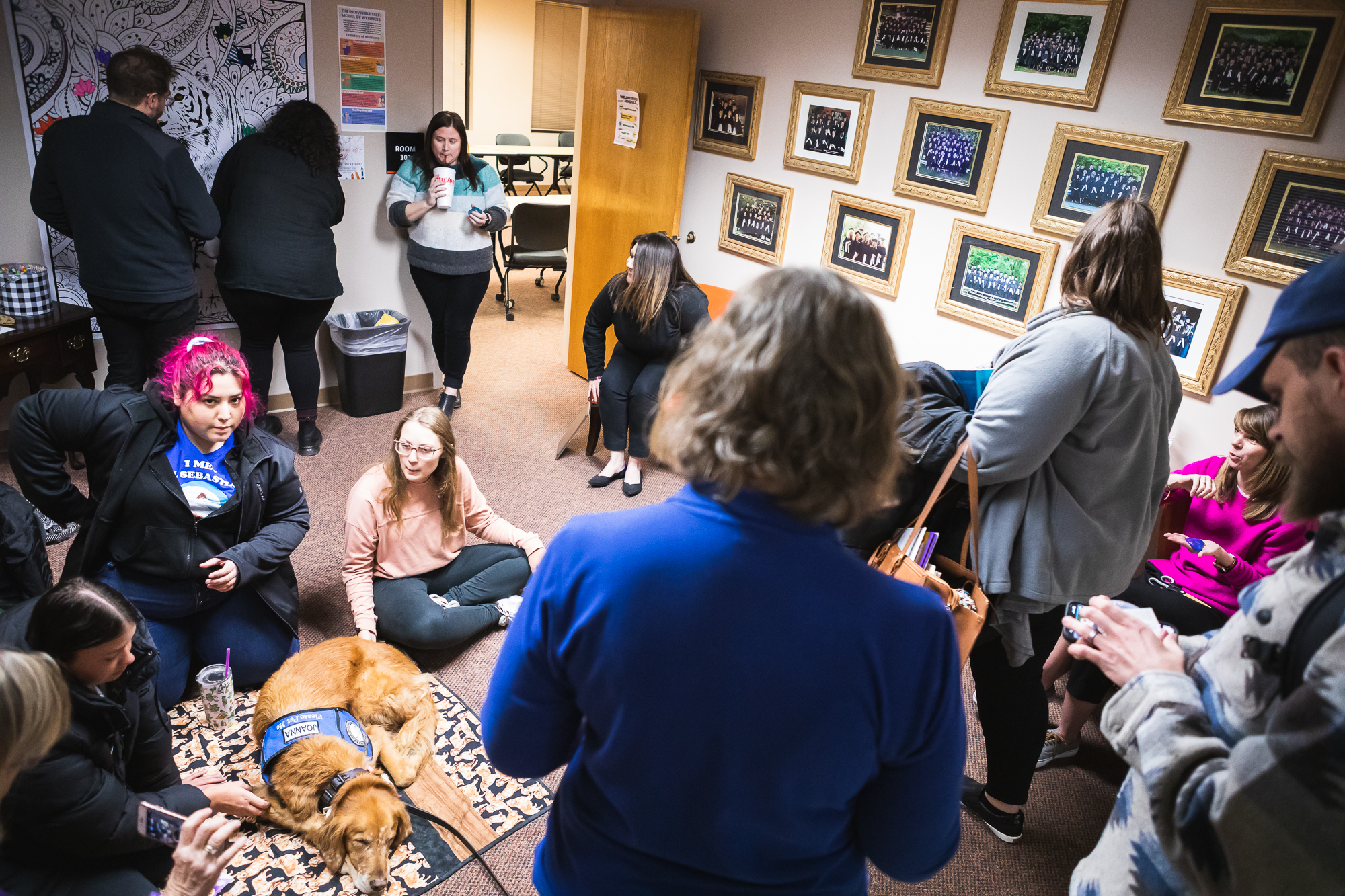 Students and faculty gather and chat before evening classes in the Master of Arts in Counseling building.