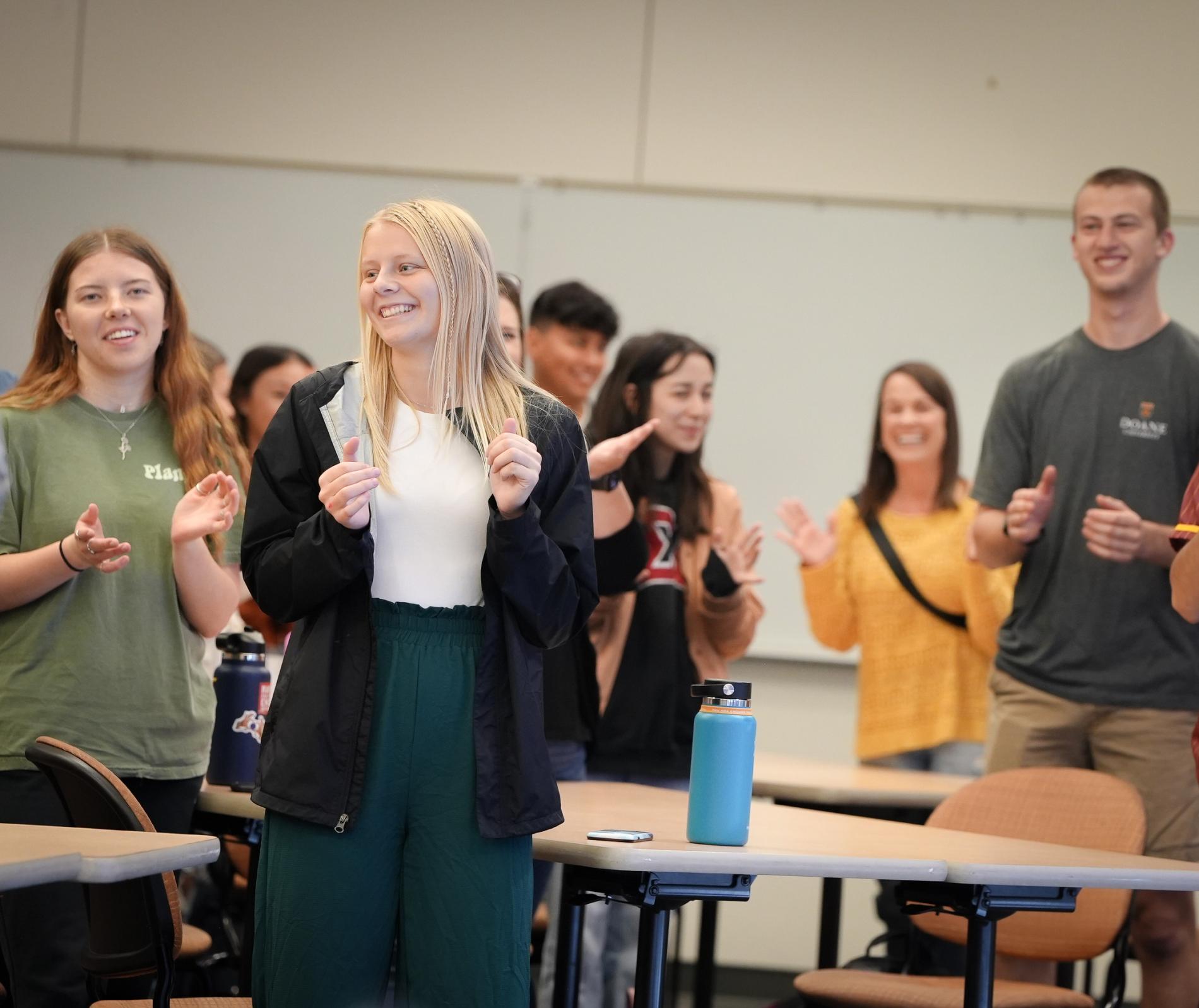 Doane students standing in a classroom