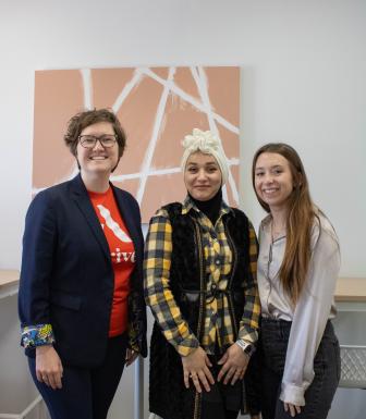 Hiam Al Naqqash stands with two other women