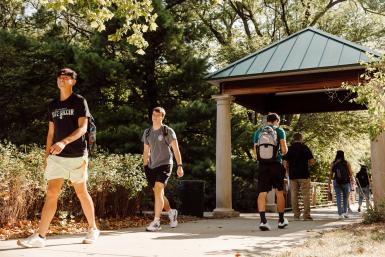 Students walk on Doane's crete campus